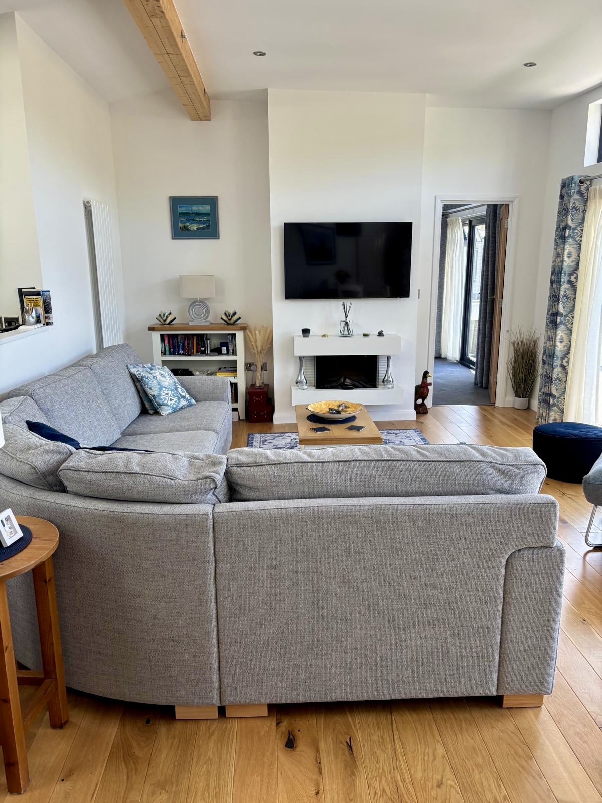 bespoke lodge lounge featuring grey corner sofa