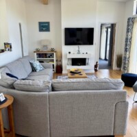 bespoke lodge lounge featuring grey corner sofa